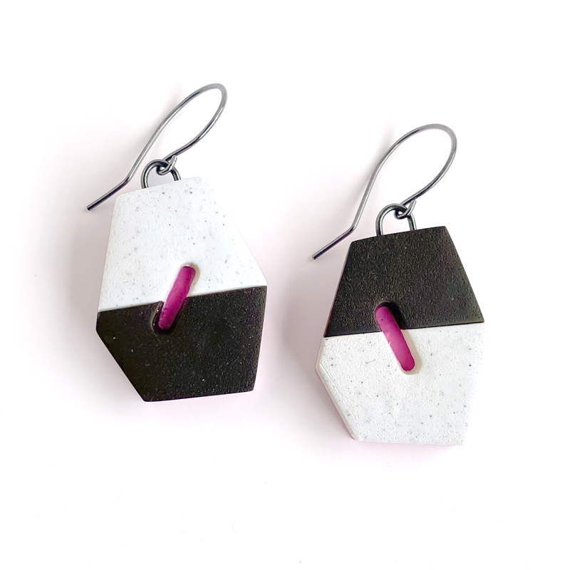 Angular polygon earrings in pink and brown with cutout window. Jane Pellicciotto