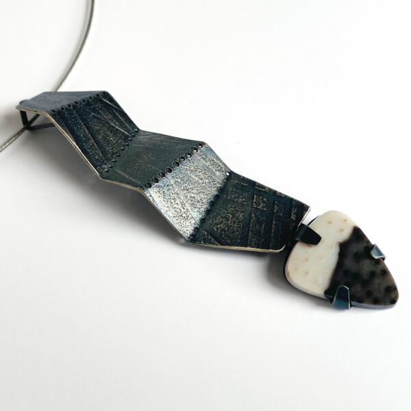Folded pendant with petrified palmwood. Sterling silver. Jane Pellicciotto