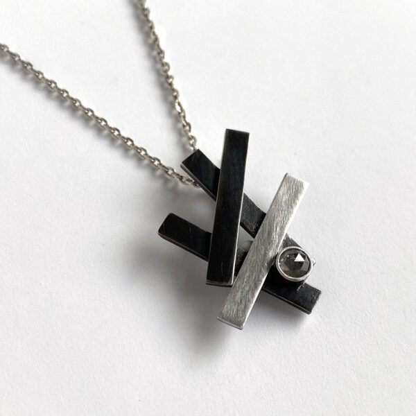 Sterling silver crosshatch pendant with natural diamond. Jane Pellicciotto