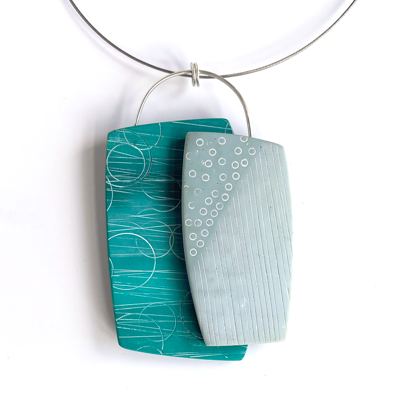 Polymer clay ocean-inspired pendant. Jane Pellicciotto
