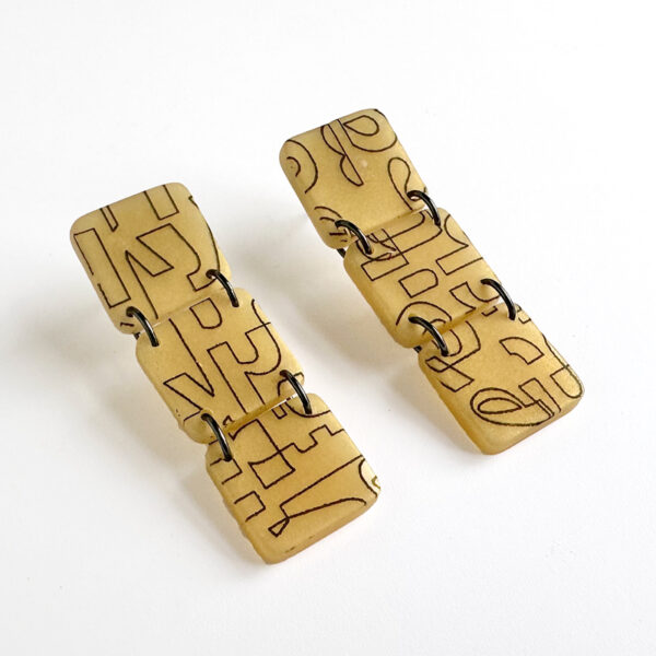 Typographic earrings. Polymer clay. Jane Pellicciotto