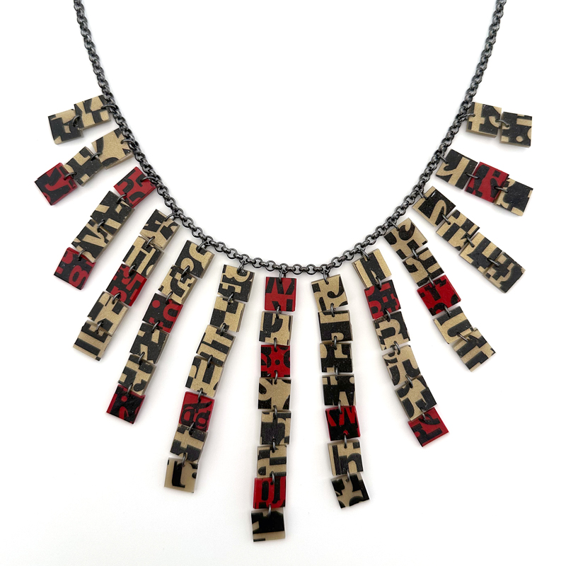 Typographic fringe necklace. Polymer clay and sterling silver. Jane Pellicciotto