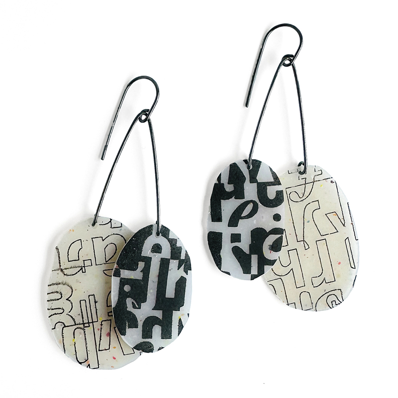 Typographic oval earrings. Polymer clay. Jane Pellicciotto